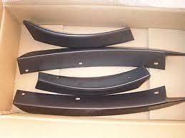 BMW X5 E53 WHEEL ARCH EXTENSION KIT FOR AERO BUMPERS NEW GENUINE 