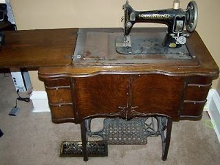ANTIQUE STANDARD SEWING MACHINE & CABINET COMPLETE WITH RECIEPT AND 