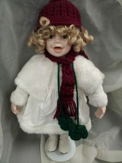Porcelain Doll with Blonde Hair and Christmas/Winter Clothing