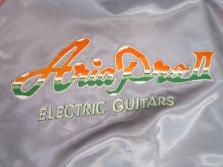 Vintage 1980s Aria Pro II Guitar Silver & Pink Satin Bomber Jacket 