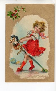B484 Postcard Christmas Frances Brundage girl riding Hobby Horse