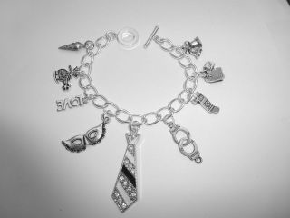   OF GREY TRILOGY SILVER TIE & CHARMS TOGGLE BRACELET CHRISTIAN AND ANA