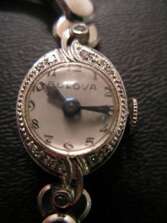   Ladies 14K White Gold Bulova Watch with Diamonds and Gold Filled Band