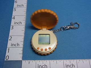 Pocket Biscuits Bisketta Virtual Pet 1997 Marks Bandai Tamagotchi