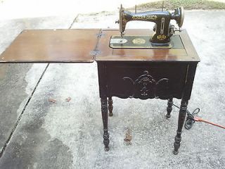   listed Vintage New Home Electric Sewing Machine Model K In Cabinet