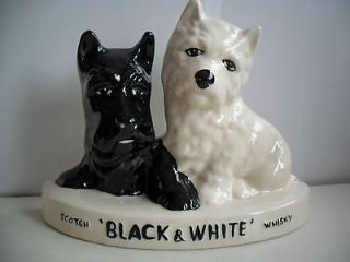 BLACK AND WHITE SCOTCH WHISKY SCOTTIE DOGS STAND