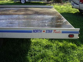 snow mobile trailer will hold two snow mobiles titls good