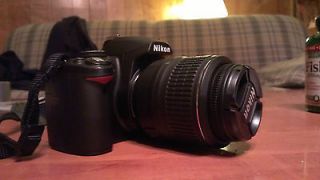 Nikon D3000 DSLR with Lens and lots of extras