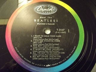 BEATLES ALBUM  33 RPM  MEET THE BEATLES ON CAPITOL RECORD  NO COVER