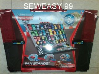 Disney Pixar Cars 2 FAN STAND holds 40 cars VERY NEW