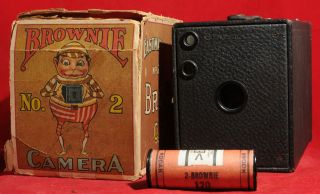 EARLY KODAK BROWNIE NO.2 [MODEL D] WITH FILM AND PALMER COX BOX.