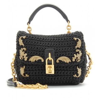 Black crochet mini bag with detachable shoulder strap and bronze toned 