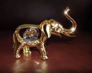 swarovski crystal elephant figurines in Figurines