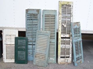 assorted sets of old rough country shutters 