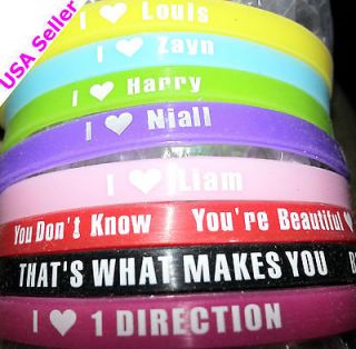   Set of 8 One Direction 5 millimeter silicone bracelets (wristbands