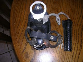 Smith and Wesson Polcie Handcuffs and Mag Light Holder