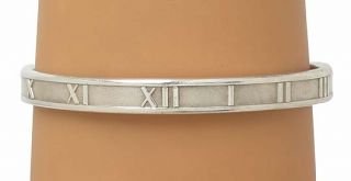   auction is a tiffany co roman atlas collection sterling silver bangle