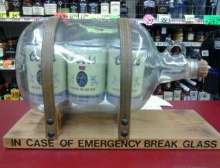   Six Pack Cans in A Bottle in Case of An Emergency Break Glass