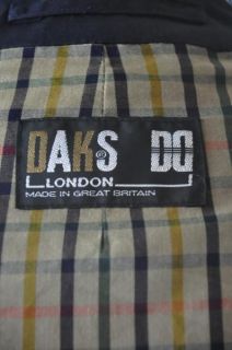 This is a classic signature daks waterproof overcoat with a signature 