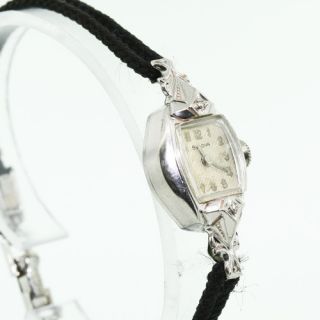   Estate Ladies Bulova 10K White Gold Bezel Stainless Steel Watch