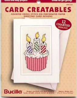this is a new cross stitch pattern booklet containing 12 charted 