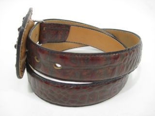 you are bidding on a fred coen brown leather mock croc belt in a size
