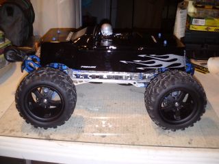 TRAXXAS EMAXX 3903 WATERPROOF ,COMES WITH 2 5000 milliamp LIPOS.PIMPED