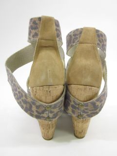 you are bidding on a pair of new in box dani black camel animal print