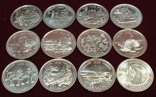 details a complete set of the 1999 millenium quarters from mint rolls