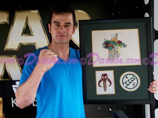 Daniel Logan (the young Boba Fett) holding the illustration Donald