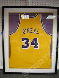 The jersey is VERY NICELY framed with a CERTIFICATE OF AUTHENTICITY