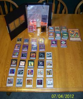 Over 700 Yu Gi Oh cards 28 rare 2 deck boxes binder and more