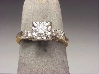  from 14k two tone gold with an approx 40 ct h si2 diamond set in