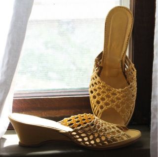 Darling, (two) of a kind, summery, muted mustard yellow sandals. The