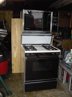TAPPAN DOUBLE OVEN GAS RANGE ALMOND COLOR W/BLACK GLASS FRONT & NITE