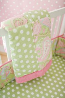 The Pixi Baby in Pink 6 Piece Crib Bedding set includes: quilt, bumper