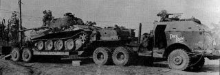 Dry Run is an armoured cab Dragon Wagon that carries a Panther Ausf