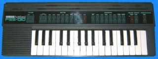 Yamaha PSS 130 Portasound Electronic Keyboard w PS