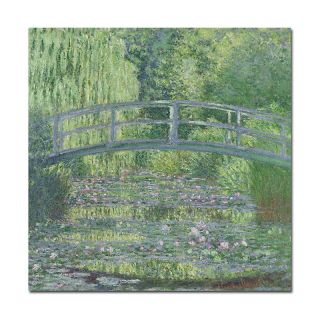 The Water Lily Pond by Claude Monet Canvas Art Print