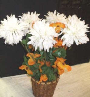 you are bidding on one silk flower arrangement this item is dusty but