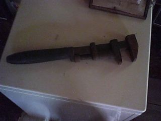 Antique adjustable monkey wrench old wood / steel handle plumbing