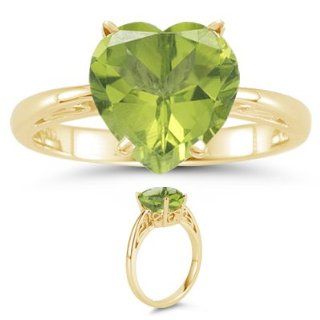 4.51 Cts Peridot Solitaire Ring in 18K Yellow Gold 7.0