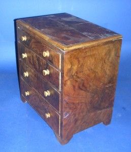 VINTAGE WALNUT MINIATURE CHEST OF FOUR GRADUATING DRAWERS