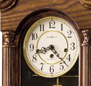Howard Miller key wound Westminster chime Oak Finish wall clock  620