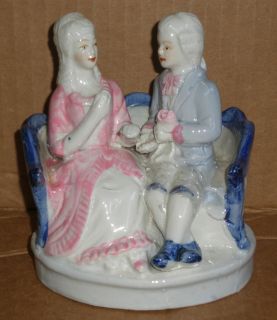 Porcelain Cobalt Blue and White Figurine Couple on A Sette