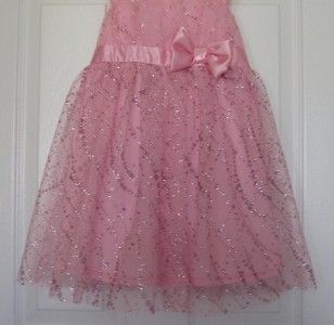 This glittery pink party dress is made by IZ AMY BYER, girls size 6.