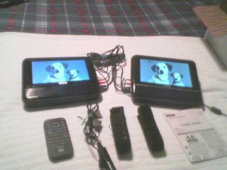 RCA DUAL SCREEN PORTABLE DVD PLAYER GREAT FOR KIDS IN CAR WORKS