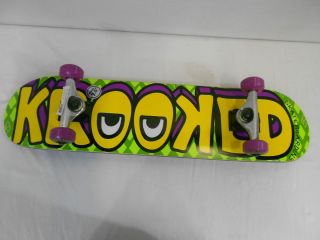 Krooked Eyes Have It 7 5 Complete Skateboard Green Yellow Purple