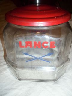 Lance Glass Jar with Red Metal Lid About 8 inches Tall