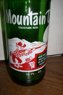 Mountain Dew Bottle  Tradmark REGD 